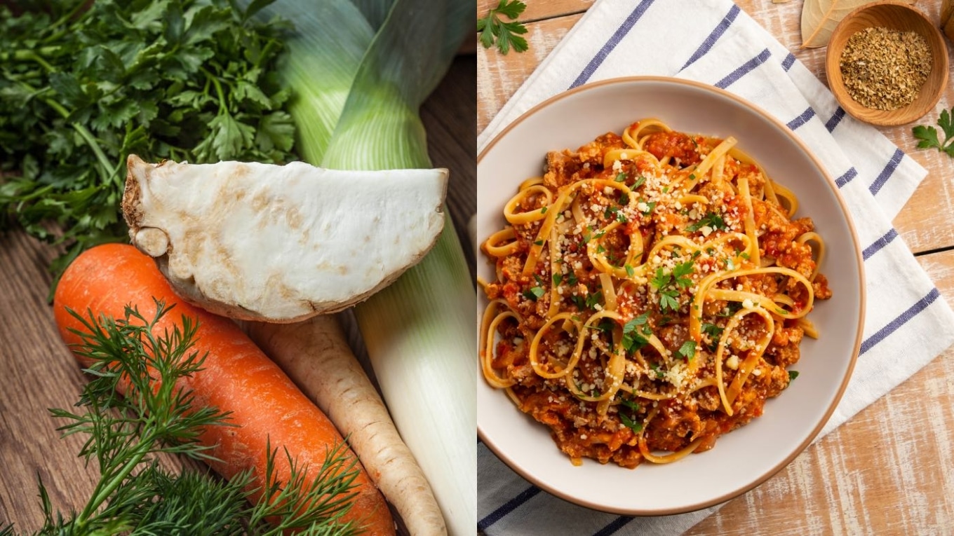 Gemüse und Nudeln mit Tomatensauce auf Tisch